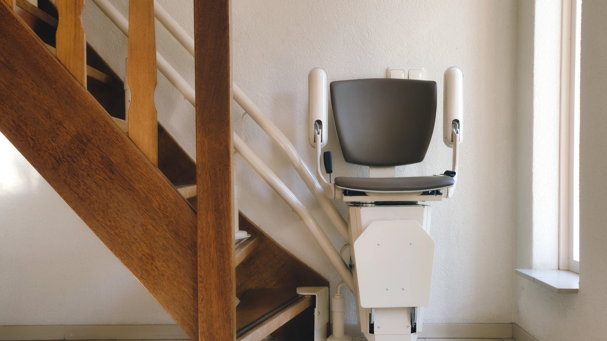 Curved stairlift installed on a residential staircase â€” buyer's guide cover image