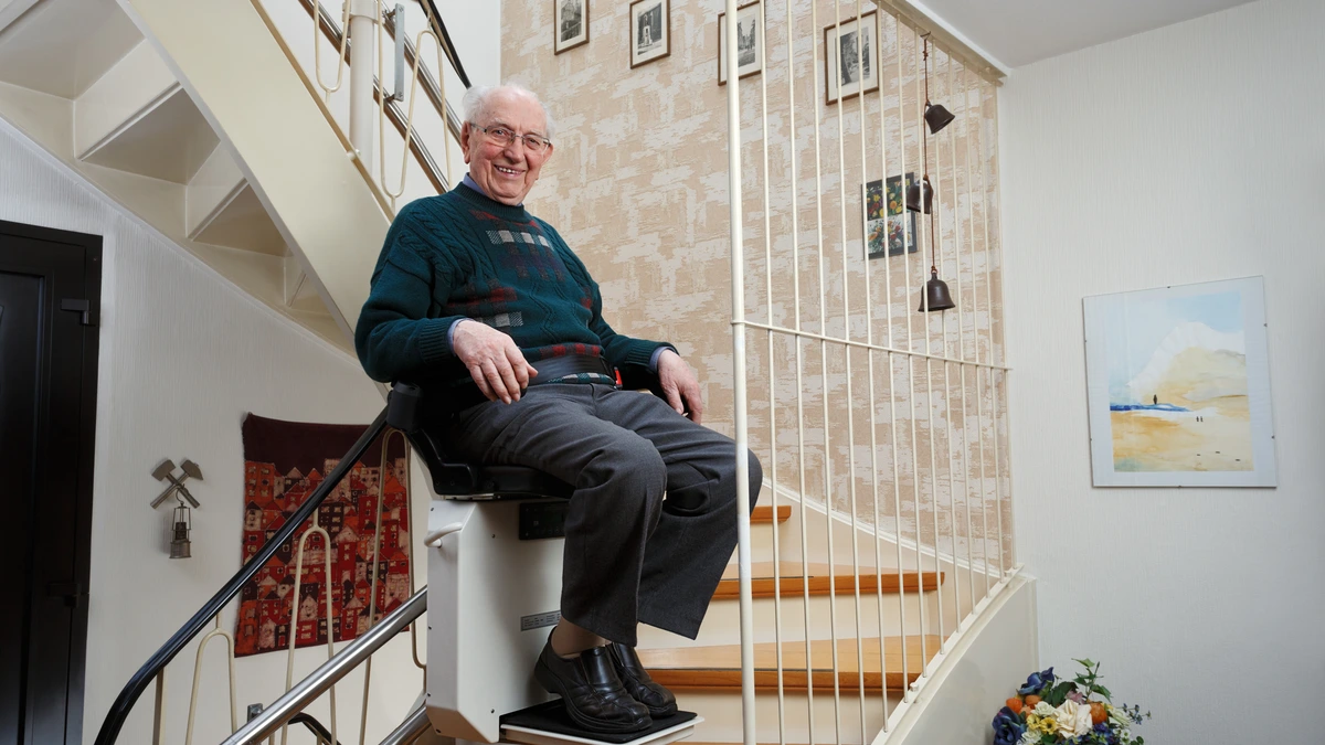 Compact cottage staircase with a straight stairlift â€” veteran's guide cover