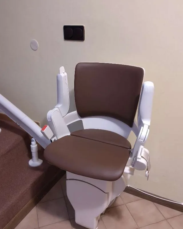 Straight stairlift installation in Sugar Land, TX — Sugar Land colonial — HOA-approved curved rail with Chapter 202 packet