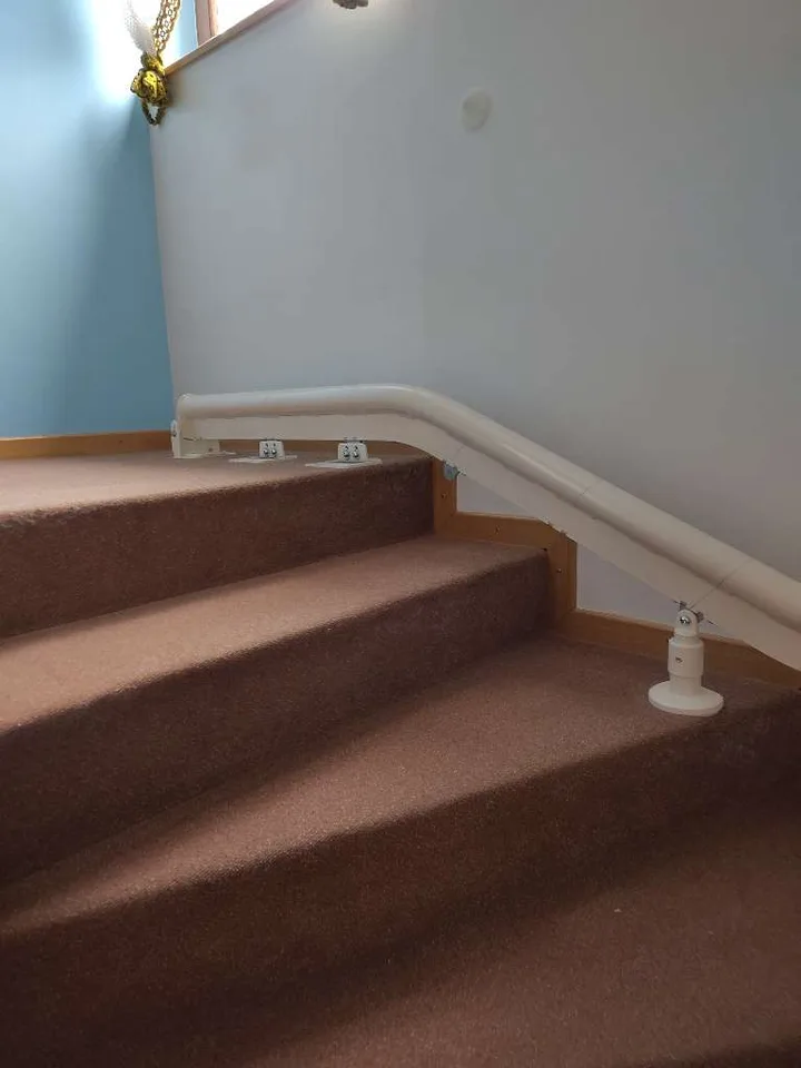 Straight stairlift installation in Sugar Land, TX — Sugar Land colonial — HOA-approved curved rail with Chapter 202 packet — photo 4