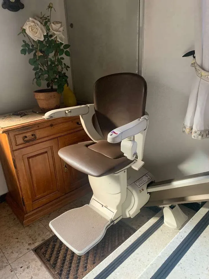 Straight stairlift installation in Bellaire, TX — Post-Harvey raised Bellaire ranch — 13-step outdoor lift to the new front door — photo 1