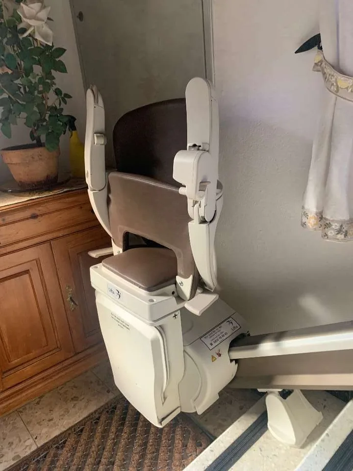 Straight stairlift installation in Bellaire, TX — Post-Harvey raised Bellaire ranch — 13-step outdoor lift to the new front door — photo 2