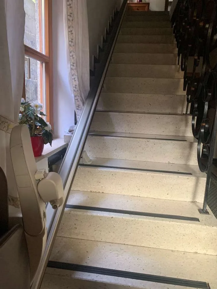Straight stairlift installation in Bellaire, TX — Post-Harvey raised Bellaire ranch — 13-step outdoor lift to the new front door — photo 3