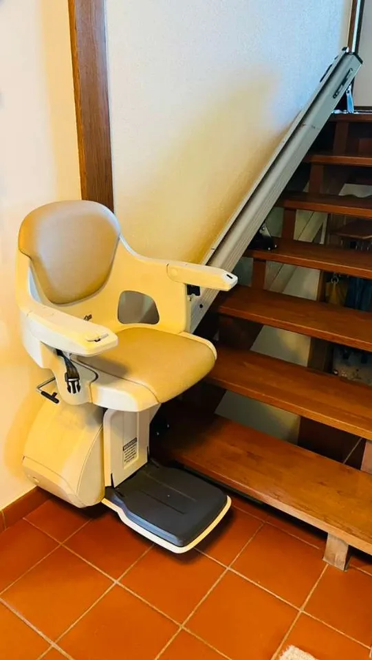 Straight stairlift installation in The Heights, TX — 1924 Heights bungalow — outdoor rail on 8 original pier-raised porch steps — photo 1