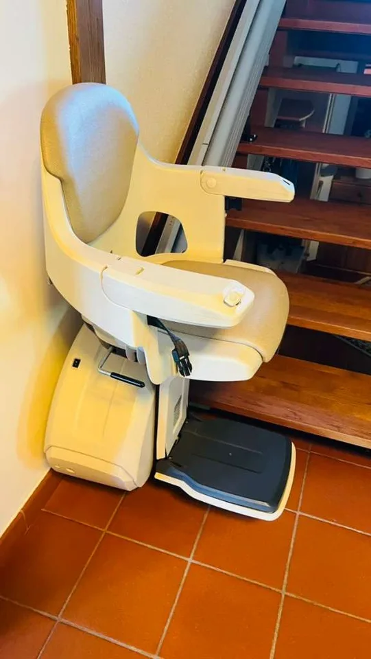 Straight stairlift installation in The Heights, TX — 1924 Heights bungalow — outdoor rail on 8 original pier-raised porch steps — photo 3